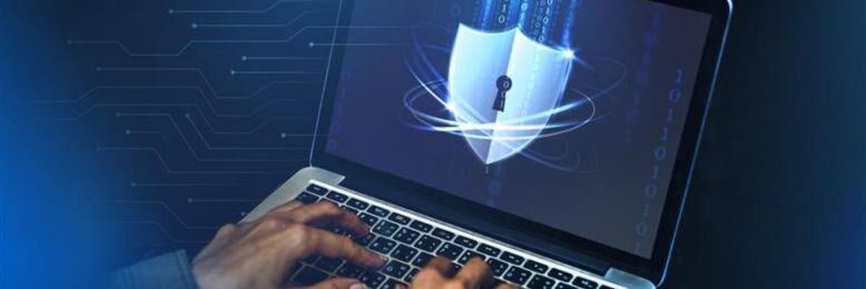 Cybersecurity measures on a laptop screen to defend against fileless malware attacks